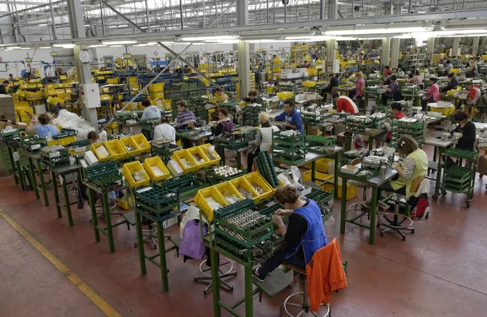 Workers on a factory floor