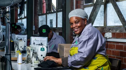 A woman at a sewing machine