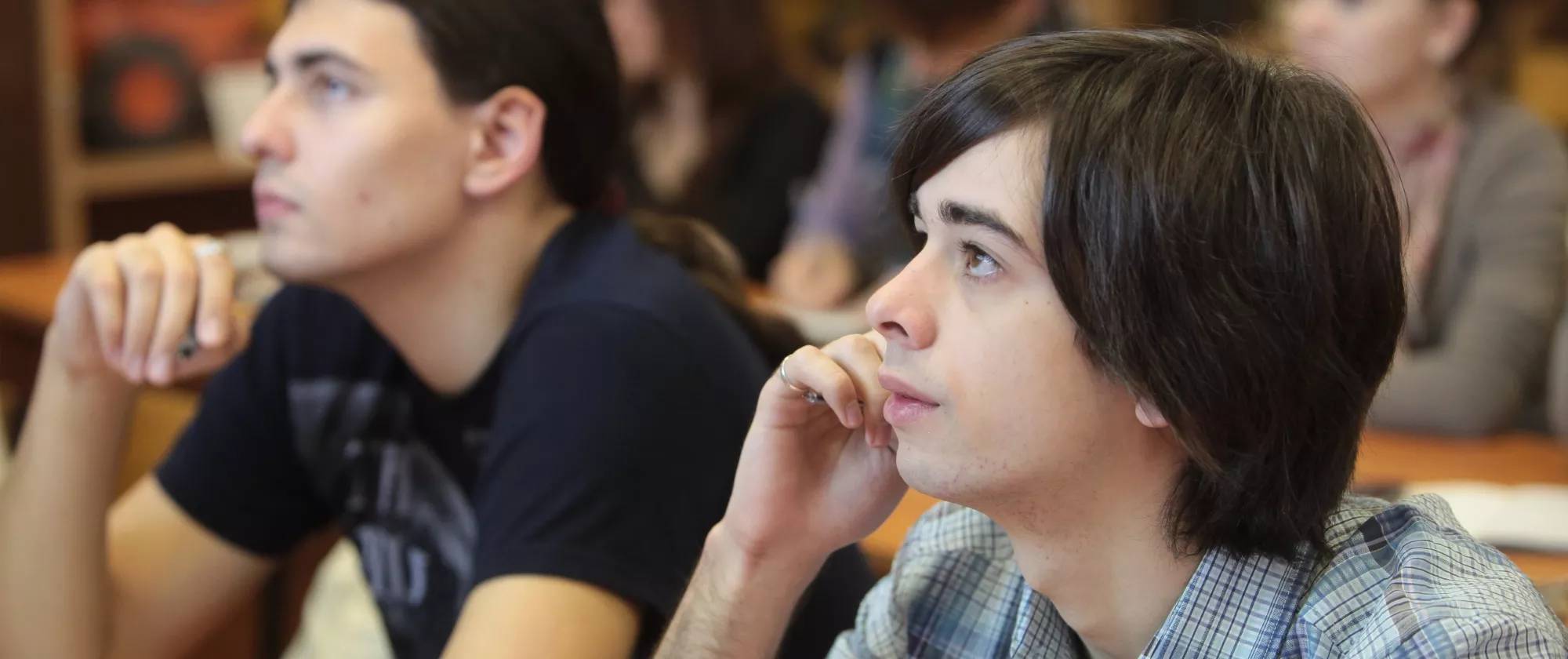 Young adults attending a class.