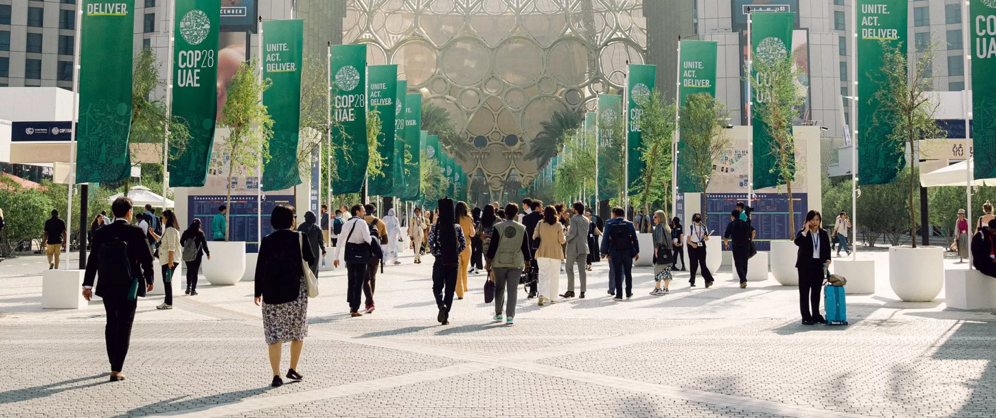 People walking to COP28 venue in Dubai, UAE