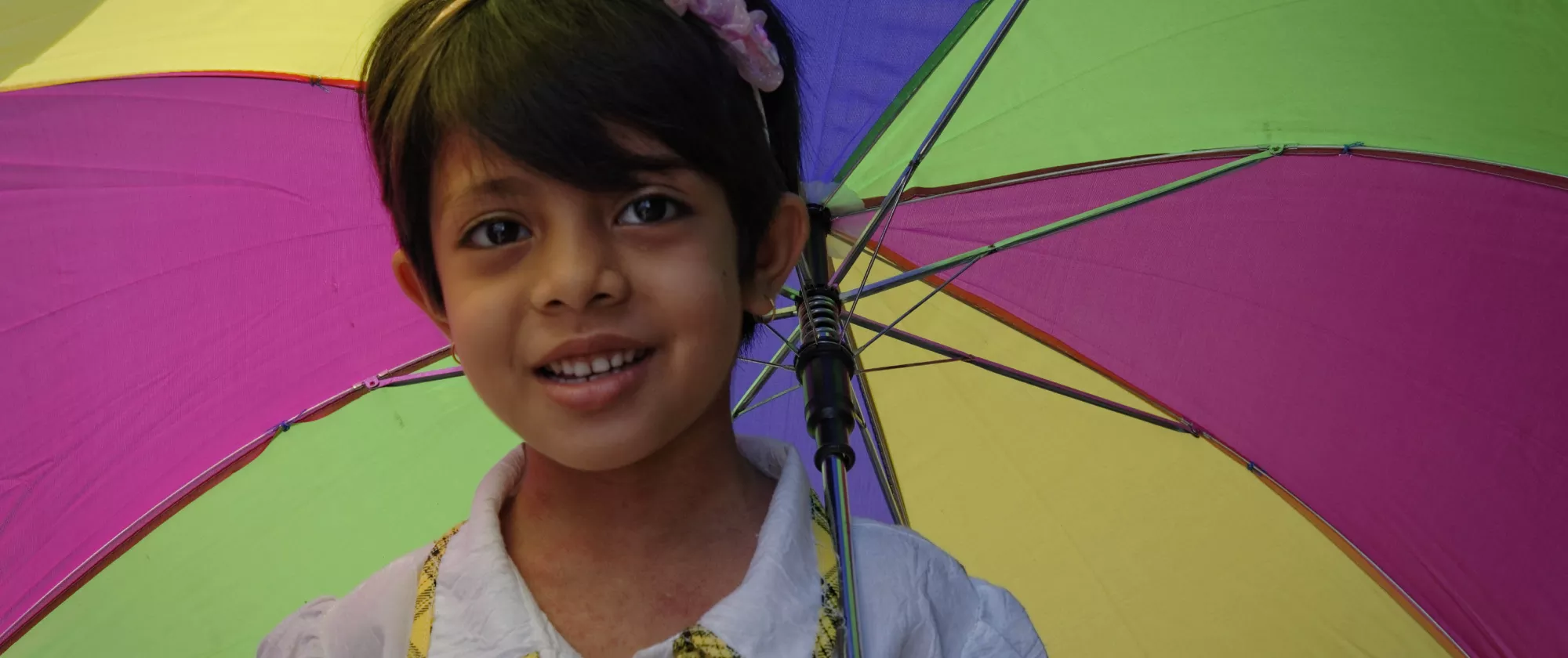 Portrait of a young girl. City of Yangon (Rangoon). Report from Myanmar, May 2013.